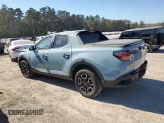 2024 Hyundai Santa Cruz SEL z VIN 5NTJBDDE8RH104510, wystawiony jako Copart lot #77585554 z przebiegiem 10 848 mil mil oraz Szkoda całkowita • Salvage title. Historia ofert i sprzedaży dostępna na DreamBid. Obrazek 2.