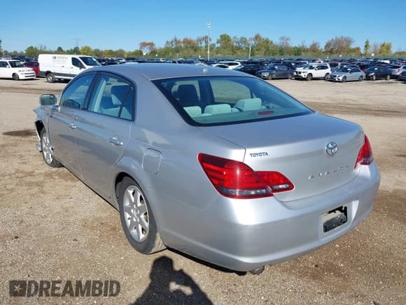 ✅ 2009 Toyota Avalon Limited • VIN: 4T1BK36B69U339327 • Lot: 43495405. Listed on IAAI with 99,003 mi. Free auction sales archive from the USA and detailed vehicle history report at DreamBid. Image 3.
