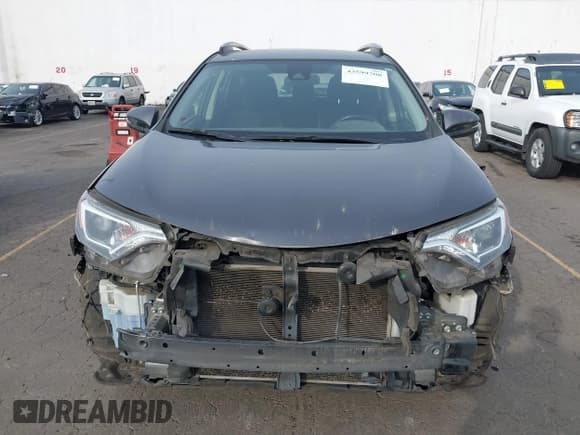 ✅ 2018 Toyota RAV4 XLE • VIN: JTMRFREV2JJ231749 • Лот: 43599708. Опубликован ранее на IAAI с пробегом 103 224 миль. Бесплатный доступ к архиву аукционных продаж из США и подробный отчёт об истории автомобиля на DreamBid. Изображение 13.