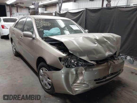 ✅ 2002 Toyota Camry LE • VIN: 4T1BE32K12U623807 • Lot: 43529281. Listed on IAAI with 184,368 mi. Free auction sales archive from the USA and detailed vehicle history report at DreamBid. Image 1.