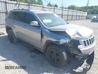 ✅ 2016 Jeep Grand Cherokee Laredo • VIN: 1C4RJFAG6GC400852 • Лот: 43128932. Опубликован ранее на IAAI с пробегом 219 285 миль. Бесплатный доступ к архиву аукционных продаж из США и подробный отчёт об истории автомобиля на DreamBid. Изображение 1.