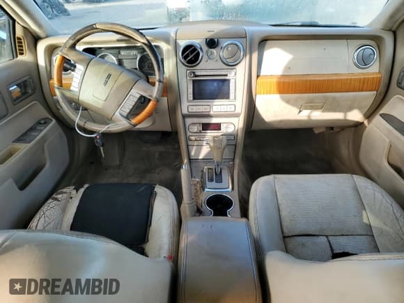 ✅ 2009 Lincoln MKZ • VIN: 3LNHM26T99R601887 • Lot: 69407775. Listed on Copart with 216,908 mi. Free auction sales archive from the USA and detailed vehicle history report at DreamBid. Image 8.