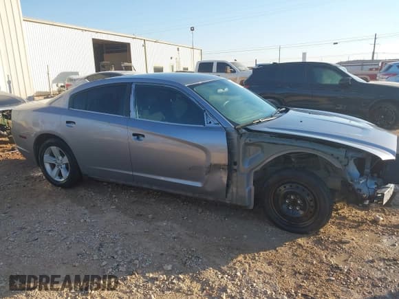✅ 2013 Dodge Charger SE • VIN: 2C3CDXBG6DH701961 • Lot: 43355152. Listed on IAAI with 113,746 mi. Free auction sales archive from the USA and detailed vehicle history report at DreamBid. Image 18.