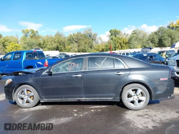 2012 Chevrolet Malibu 2LT z VIN 1G1ZD5EU4CF123265, wystawiony jako IAAI lot #43399908 z przebiegiem 146 993 mil mil oraz . Historia ofert i sprzedaży dostępna na DreamBid. Obrazek 14.