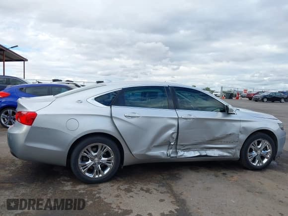 ✅ 2014 Chevrolet Impala LT • VIN: 2G1125S36E9120801 • Лот: 43439955. Опубликован ранее на IAAI с пробегом 169 655 миль. Бесплатный доступ к архиву аукционных продаж из США и подробный отчёт об истории автомобиля на DreamBid. Изображение 13.