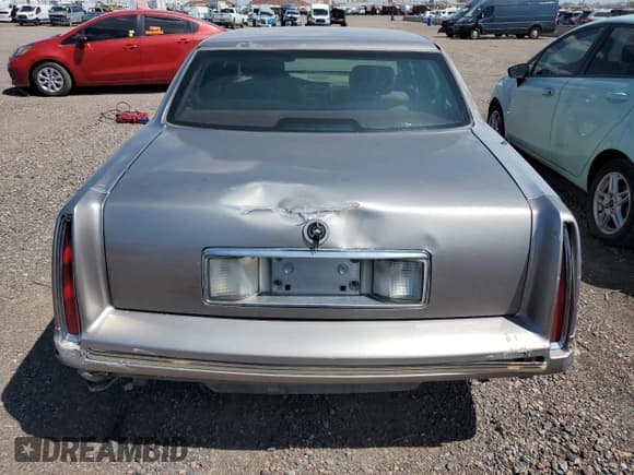 ✅ 1997 Cadillac DeVille • VIN: 1G6KD54Y1VU244446 • Lot: 80716295. Listed on Copart with Not provided. Free auction sales archive from the USA and detailed vehicle history report at DreamBid. Image 6.