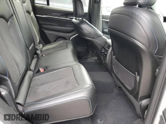 2022 Jeep Grand Cherokee Trailhawk z VIN 1C4RJYC62N8715910, wystawiony jako Copart lot #58785405 z przebiegiem 21 976 mil mil oraz Szkoda całkowita • Salvage title. Historia ofert i sprzedaży dostępna na DreamBid. Obrazek 11.