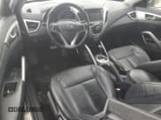 ✅ 2014 Hyundai Veloster • VIN: KMHTC6AD6EU213698 • Lot: 78961304. Wystawiony na Copart z przebiegiem 150 864 mil. Bezpłatny archiwum sprzedaży aukcyjnych z USA i szczegółowy raport historii pojazdu na DreamBid. Zdjęcie 8.