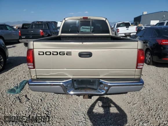 2002 Dodge Dakota SLT with VIN 1B7GL42N62S539106, listed as a Copart auction lot 66685425 with 214,210 mi miles and Salvage title. Bid and sale history available at DreamBid. Image 6.