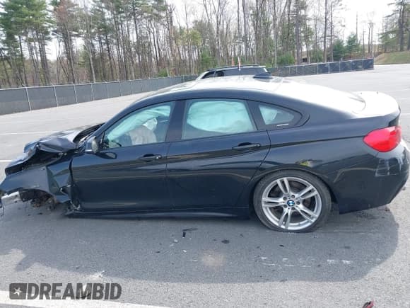 ✅ 2015 BMW 4 Series 435i xDrive • VIN: WBA4B3C55FGV48934 • Lot: 42098843. Listed on IAAI with 89,959 mi. Free auction sales archive from the USA and detailed vehicle history report at DreamBid. Image 13.