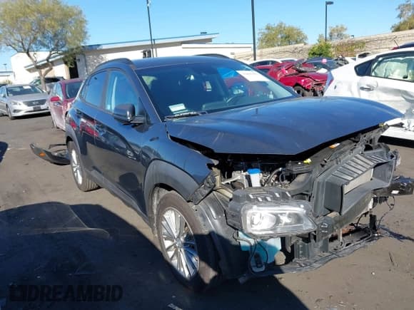 ✅ 2019 Hyundai Kona SEL • VIN: KM8K62AA1KU369063 • Лот: 43496381. Опубликован ранее на IAAI с пробегом 56 663 миль. Бесплатный доступ к архиву аукционных продаж из США и подробный отчёт об истории автомобиля на DreamBid. Изображение 14.