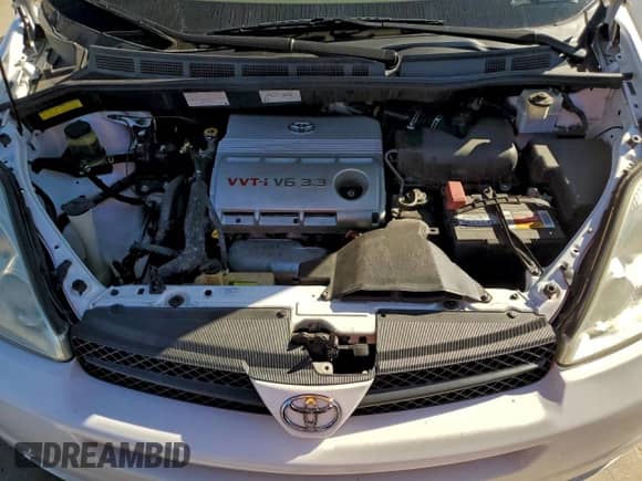 2005 Toyota Sienna LE z VIN 5TDZA23C35S293886, wystawiony jako Copart lot #90938105 z przebiegiem 133 550 mil mil oraz Szkoda całkowita • Salvage title. Historia ofert i sprzedaży dostępna na DreamBid. Obrazek 12.