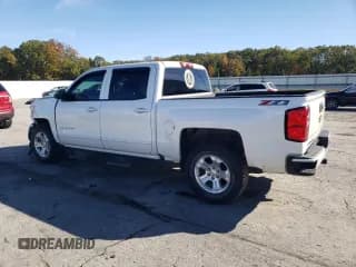✅ 2018 Chevrolet Silverado 1500 LT • VIN: 3GCUKREC7JG124119 • Lot: 89725465. Wystawiony na Copart z przebiegiem 111 091 mil. Bezpłatny archiwum sprzedaży aukcyjnych z USA i szczegółowy raport historii pojazdu na DreamBid. Zdjęcie 2.