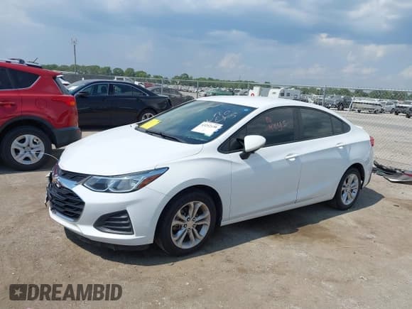 ✅ 2019 Chevrolet Cruze LS • VIN: 1G1BC5SM1K7110801 • Lot: 43252138. Listed on IAAI with 126,551 mi. Free auction sales archive from the USA and detailed vehicle history report at DreamBid. Image 17.