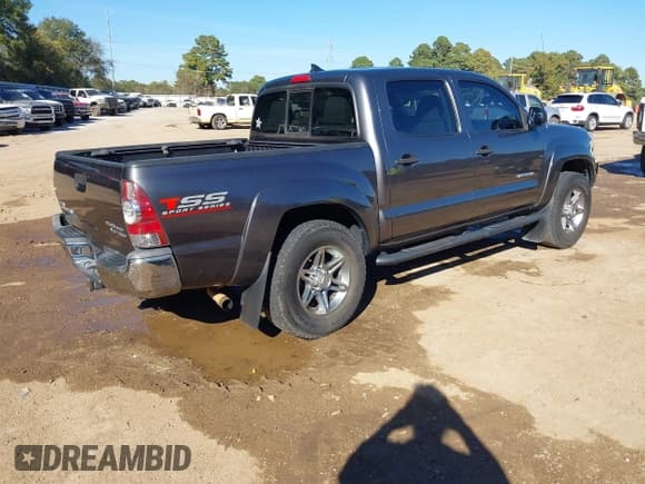✅ 2014 Toyota Tacoma PreRunner • VIN: 5TFJU4GN5EX058881 • Lot: 43603920. Listed on IAAI with 170,876 mi. Free auction sales archive from the USA and detailed vehicle history report at DreamBid. Image 4.