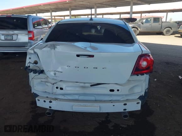 ✅ 2014 Dodge Avenger SE • VIN: 1C3CDZAG9EN220608 • Lot: 43577478. Listed on IAAI with 126,351 mi. Free auction sales archive from the USA and detailed vehicle history report at DreamBid. Image 17.