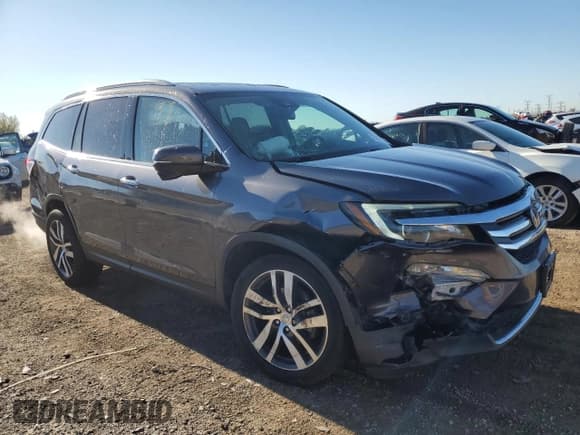 ✅ 2018 Honda Pilot Touring • VIN: 5FNYF6H91JB005668 • Лот: 85587675. Опубликован ранее на Copart с пробегом 104 956 миль. Бесплатный доступ к архиву аукционных продаж из США и подробный отчёт об истории автомобиля на DreamBid. Изображение 4.