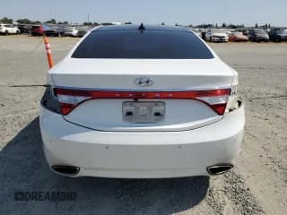 ✅ 2013 Hyundai Azera • VIN: KMHFH4JG9DA209562 • Лот: 59808655. Опубликован ранее на Copart с пробегом 130 994 миль. Бесплатный доступ к архиву аукционных продаж из США и подробный отчёт об истории автомобиля на DreamBid. Изображение 6.