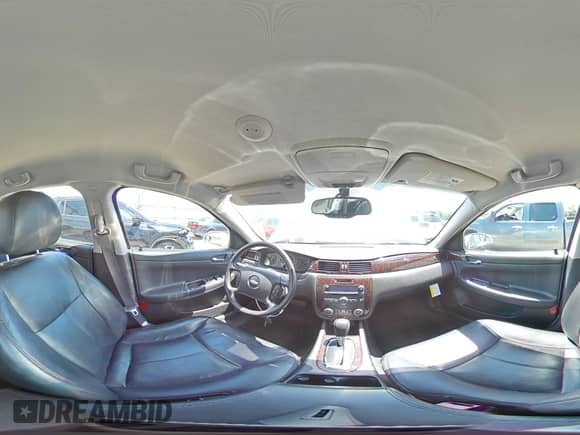 2012 Chevrolet Impala LTZ z VIN 2G1WC5E38C1292774, wystawiony jako Copart lot #63310415 z przebiegiem 153 804 mil mil oraz Szkoda całkowita • Salvage title. Historia ofert i sprzedaży dostępna na DreamBid. Obrazek 14.