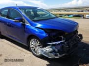 ✅ 2015 Ford Focus Titanium • VIN: 1FADP3N27FL379763 • Lot: 71919255. Listed on Copart with 66,838 mi. Free auction sales archive from the USA and detailed vehicle history report at DreamBid. Image 14.