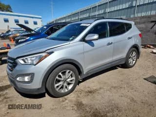 ✅ 2016 Hyundai Santa Fe • VIN: 5XYZUDLA1GG341578 • Lot: 85131885. Listed on Copart with 142,097 mi. Free auction sales archive from the USA and detailed vehicle history report at DreamBid. Image 1.