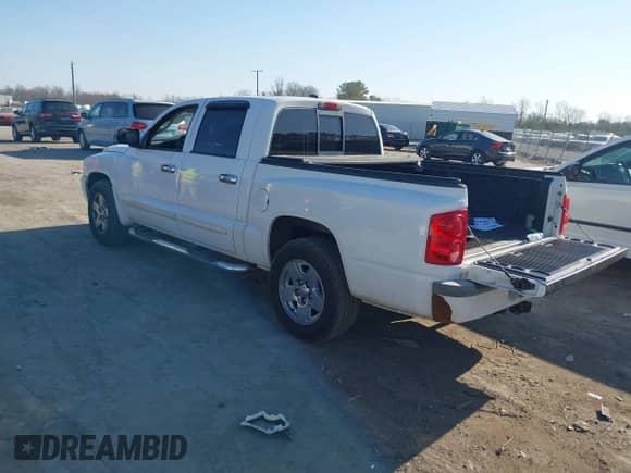 2005 Dodge Dakota Laramie with VIN 1D7HE58N95S138915, listed as a IAAI auction lot 41789883 with 342,402 mi miles and . Bid and sale history available at DreamBid. Image 3.