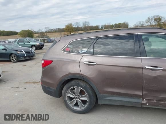 ✅ 2015 Hyundai Santa Fe GLS • VIN: KM8SMDHF4FU103061 • Лот: 43544205. Опубликован ранее на IAAI с пробегом 106 991 миль. Бесплатный доступ к архиву аукционных продаж из США и подробный отчёт об истории автомобиля на DreamBid. Изображение 19.