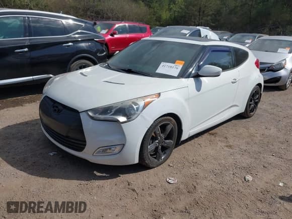 ✅ 2014 Hyundai Veloster • VIN: KMHTC6AD1EU217707 • Lot: 41718176. Wystawiony na IAAI z przebiegiem 191 306 mil. Bezpłatny archiwum sprzedaży aukcyjnych z USA i szczegółowy raport historii pojazdu na DreamBid. Zdjęcie 2.