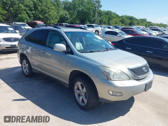 ✅ 2007 Lexus RX 350 • VIN: 2T2HK31UX7C024222 • Lot: 42245924. Listed on IAAI with 228,442 mi. Free auction sales archive from the USA and detailed vehicle history report at DreamBid. Image 1.