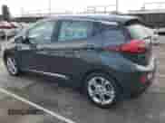 2018 Chevrolet Bolt EV LT z VIN 1G1FW6S0XJ4140438, wystawiony jako Copart lot #38987334 z przebiegiem 63 812 mil mil oraz . Historia ofert i sprzedaży dostępna na DreamBid. Obrazek 2.