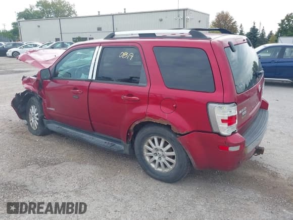 ✅ 2008 Mercury Mariner Premier • VIN: 4M2CU97128KJ07680 • Lot: 43220817. Listed on IAAI with 236,032 mi. Free auction sales archive from the USA and detailed vehicle history report at DreamBid. Image 3.