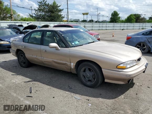 ✅ 1994 Pontiac Bonneville SE • VIN: 1G2HX52L8R4280540 • Lot: 52730244. Wystawiony na Copart z przebiegiem 164 728 mil. Bezpłatny archiwum sprzedaży aukcyjnych z USA i szczegółowy raport historii pojazdu na DreamBid. Zdjęcie 4.