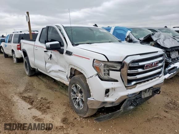✅ 2021 GMC Sierra 1500 SLE • VIN: 1GTR9BEDXMZ415428 • Лот: 53950975. Опубликован ранее на Copart с пробегом 218 710 миль. Бесплатный доступ к архиву аукционных продаж из США и подробный отчёт об истории автомобиля на DreamBid. Изображение 4.