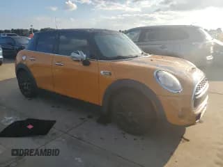 ✅ 2015 MINI Hardtop 4 Door S • VIN: WMWXU3C50F2B65877 • Lot: 73880124. Listed on Copart with 92,270 mi. Free auction sales archive from the USA and detailed vehicle history report at DreamBid. Image 4.