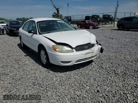 ✅ 2006 Ford Taurus SE • VIN: 1FAFP53256A125309 • Lot: 80096585. Listed on Copart with 243,463 mi. Free auction sales archive from the USA and detailed vehicle history report at DreamBid. Image 13.