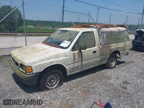 ✅ 1992 Isuzu Pickup S • VIN: 4S1CL11L3N4207154 • Lot: 42470949. Wystawiony na IAAI z przebiegiem 309 488 mil. Bezpłatny archiwum sprzedaży aukcyjnych z USA i szczegółowy raport historii pojazdu na DreamBid. Zdjęcie 2.