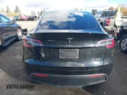 ✅ 2023 Tesla Model Y Long Range • VIN: 7SAYGDEEXPF689909 • Lot: 43551907. Listed on IAAI with 57,191 mi. Free auction sales archive from the USA and detailed vehicle history report at DreamBid. Image 17.