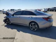 ✅ 2023 Hyundai Elantra N Line • VIN: KMHLR4AF8PU542264 • Lot: 85589545. Listed on Copart with 17,705 mi. Free auction sales archive from the USA and detailed vehicle history report at DreamBid. Image 2.