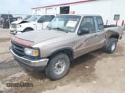 ✅ 1996 Mazda B-Series • VIN: 4F4CR17X1TTM05189 • Lot: 42009381. Wystawiony na IAAI z przebiegiem 127 675 mil. Bezpłatny archiwum sprzedaży aukcyjnych z USA i szczegółowy raport historii pojazdu na DreamBid. Zdjęcie 2.