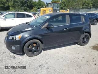 2013 Chevrolet Sonic LTZ с VIN 1G1JF6SB5D4183715, выставлен на аукционе Copart как лот 68351275 с пробегом 145 885 миль миль и Чистый • Clean title. История ставок и продаж доступна на DreamBid. Изображение 1.