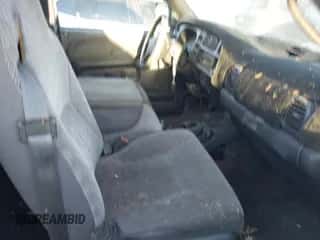 1999 Dodge 1500 z VIN 3B7HC13Y5XG168269, wystawiony jako IAAI lot #43357129 z przebiegiem Nie podano mil oraz . Historia ofert i sprzedaży dostępna na DreamBid. Obrazek 5.