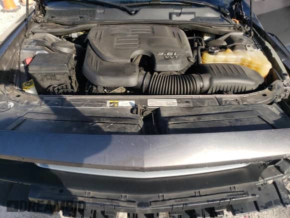 2014 Dodge Challenger SXT z VIN 2C3CDYAG4EH313829, wystawiony jako Copart lot #68274174 z przebiegiem Nie podano mil oraz Szkoda całkowita • Salvage title. Historia ofert i sprzedaży dostępna na DreamBid. Obrazek 11.