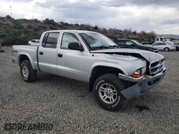 ✅ 2003 Dodge Dakota SLT • VIN: 1D7HG48NX3S261527 • Lot: 52986385. Wystawiony na Copart z przebiegiem 163 807 mil. Bezpłatny archiwum sprzedaży aukcyjnych z USA i szczegółowy raport historii pojazdu na DreamBid. Zdjęcie 4.
