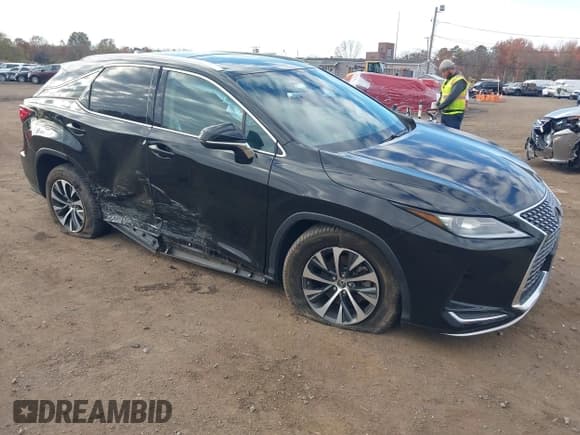 ✅ 2020 Lexus RX 350 • VIN: 2T2HZMDA2LC218921 • Lot: 43583192. Listed on IAAI with 90,515 mi. Free auction sales archive from the USA and detailed vehicle history report at DreamBid. Image 1.