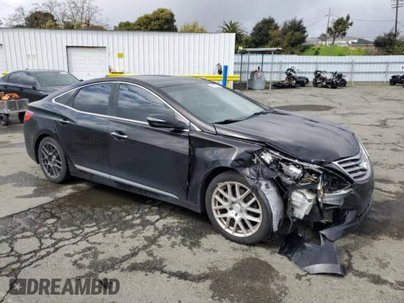 2013 Hyundai Azera z VIN KMHFH4JG0DA258021, wystawiony jako Copart lot #49187915 z przebiegiem 141 798 mil mil oraz Szkoda całkowita • Salvage title. Historia ofert i sprzedaży dostępna na DreamBid. Obrazek 4.
