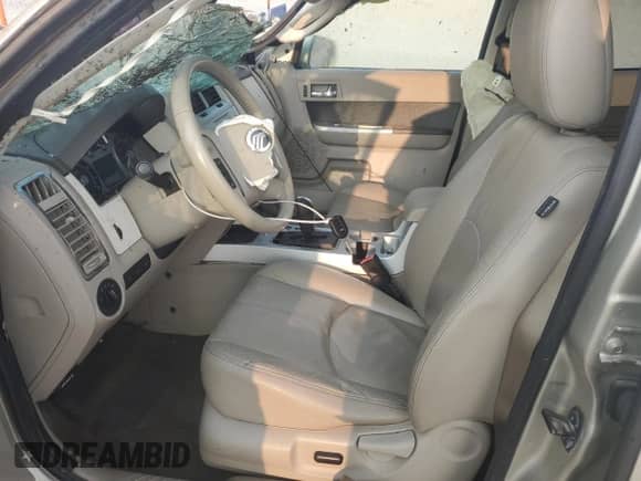 2010 Mercury Mariner Premier с VIN 4M2CN9HG4AKJ12675, выставлен на аукционе Copart как лот 71417445 с пробегом Не указан миль и Списание • Salvage title. История ставок и продаж доступна на DreamBid. Изображение 7.