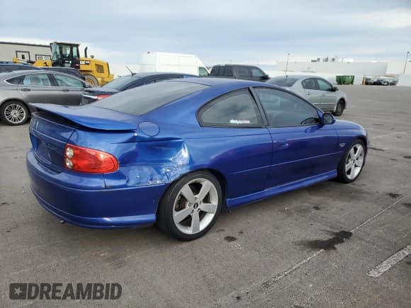 ✅ 2004 Pontiac GTO • VIN: 6G2VX12G04L305804 • Lot: 86404804. Listed on Copart with 203,637 mi. Free auction sales archive from the USA and detailed vehicle history report at DreamBid. Image 3.