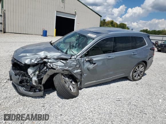 ✅ 2023 Cadillac XT6 AWD Premium Luxury • VIN: 1GYKPDRS9PZ119682 • Lot: 71157415. Listed on Copart with 33,808 mi. Free auction sales archive from the USA and detailed vehicle history report at DreamBid. Image 1.