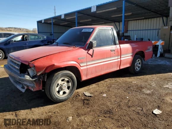 ✅ 1987 Mazda B-Series SE5 • VIN: JM2UF1114H0546272 • Лот: 89002935. Опубликован ранее на Copart с пробегом 108 979 миль. Бесплатный доступ к архиву аукционных продаж из США и подробный отчёт об истории автомобиля на DreamBid. Изображение 1.