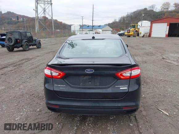 ✅ 2016 Ford Fusion Titanium • VIN: 3FA6P0K91GR261347 • Lot: 43737815. Listed on IAAI with 205,791 mi. Free auction sales archive from the USA and detailed vehicle history report at DreamBid. Image 16.